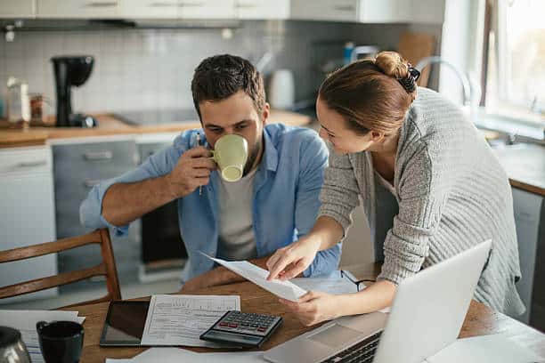 couple talks about how much home refinance appraisal - How Can You Stop Foreclosure on Your Home?