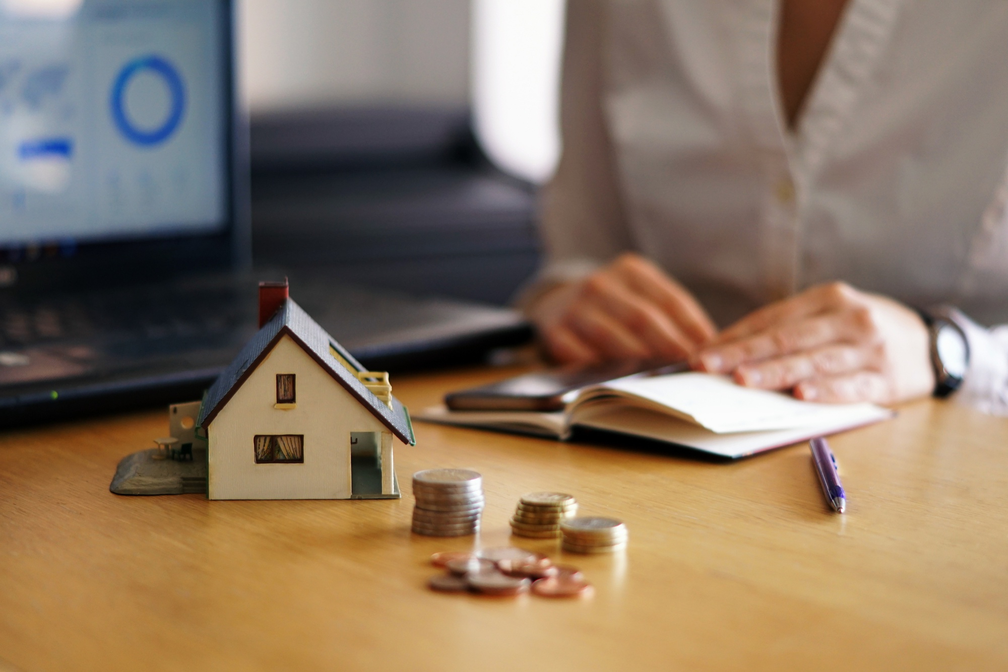 closeup shot person thinking buying selling house 1 - Secured Line of Credit - A Homeowner's Safety Net