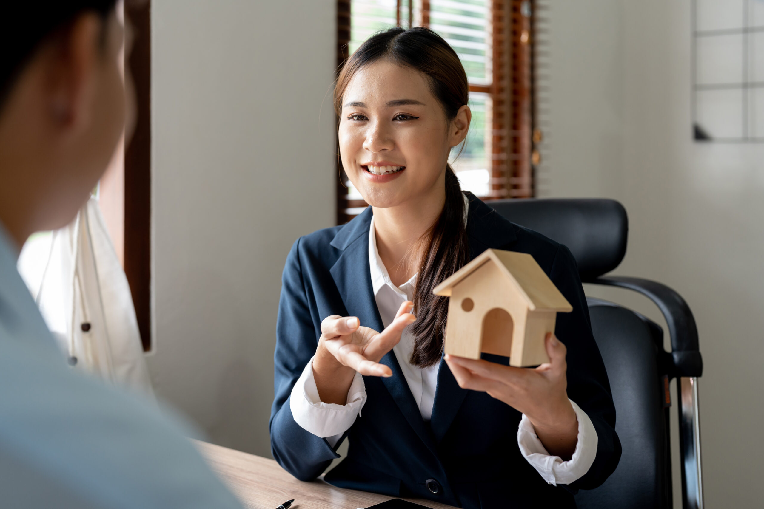 real estate agent offer house represented by model client scaled 1 - Secured Line of Credit - A Homeowner's Safety Net