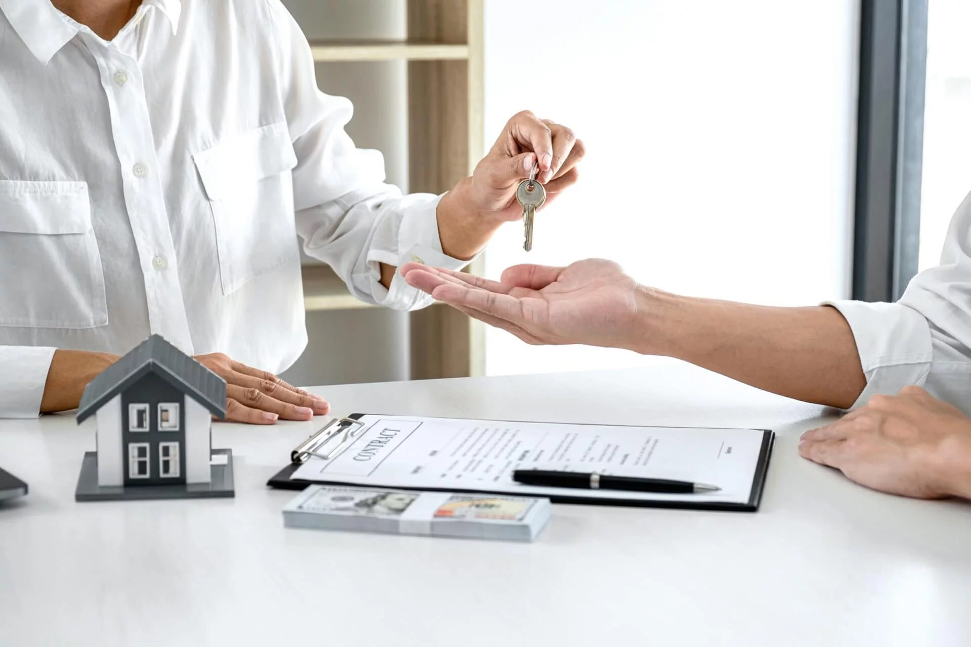 real-estate-agent-sales-manager-holding-filing-keys-customer-after-signing-rental-lease-contract-sale-purchase-agreement-concerning-mortgage-loan-offer-house-insurance how does a home equity loan work