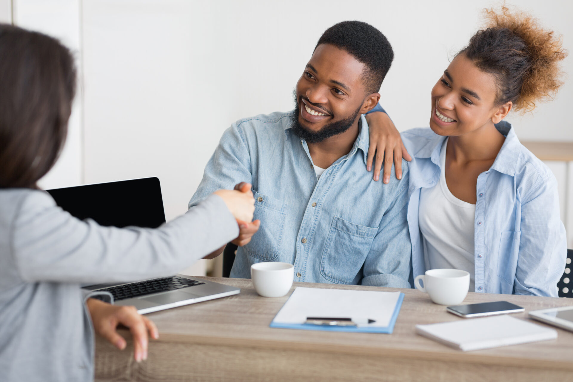 Man holding receipt, making financial revision heloc vs home equity loan