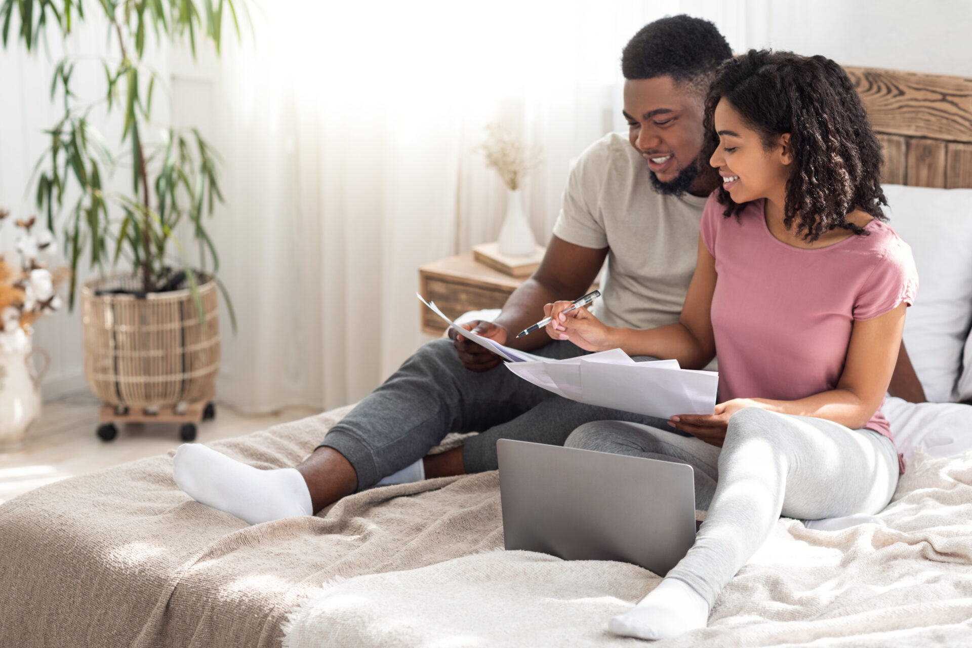 Man holding receipt, making financial revision heloc vs home equity loan